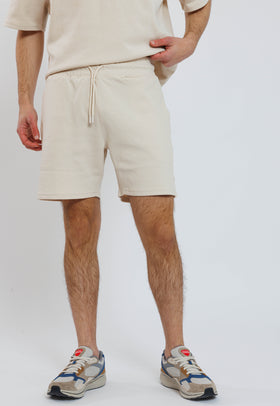 מכנס אינטרלוק קצר צבע בז'